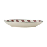 Side profile of the Jolly Striped Stoneware Christmas Plate in cream with red stripes and a thin green rim line, shown on a plain white background.