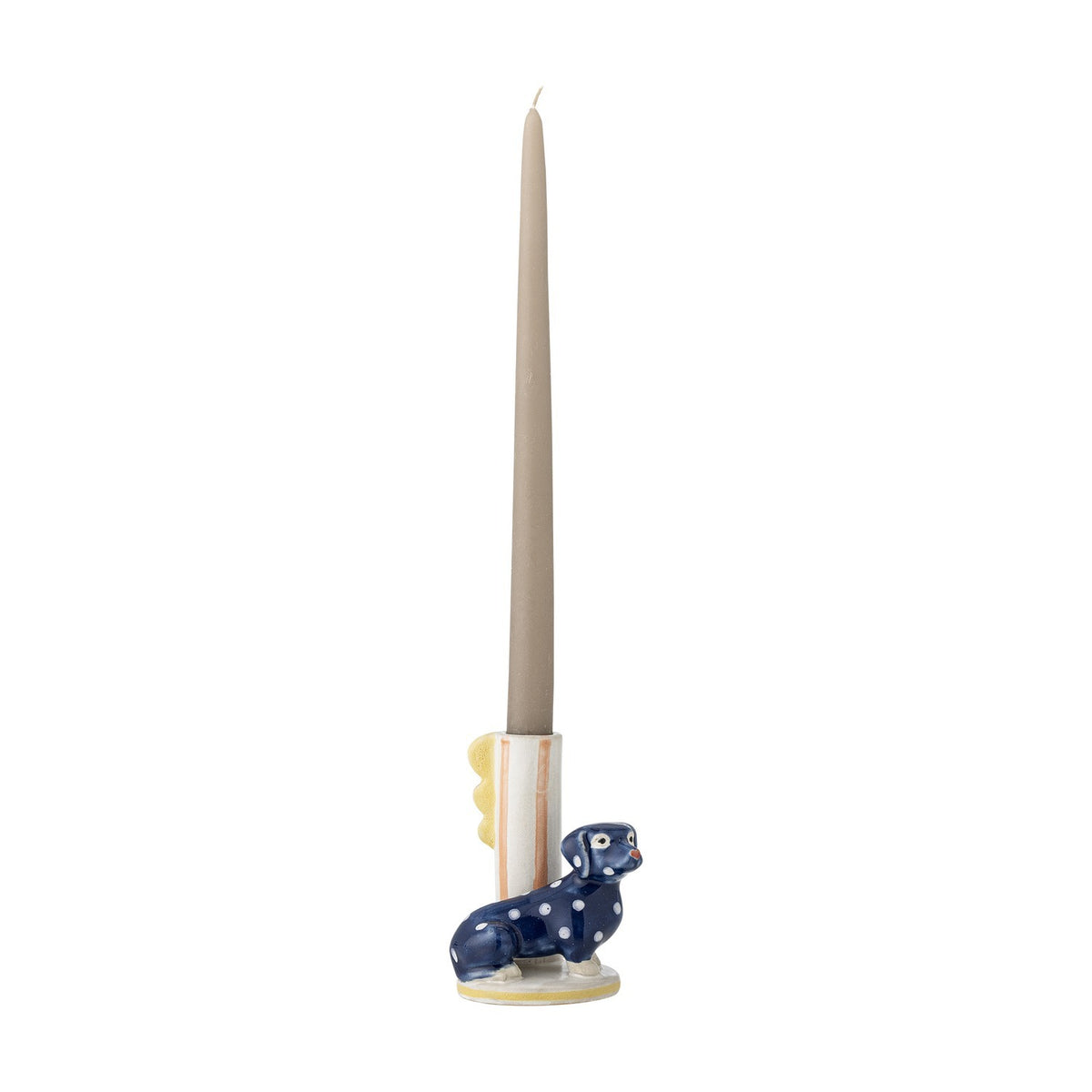 Stoneware candle holder shaped like a seated navy polka-dot dachshund beside a striped cylindrical holder with a scalloped fin, holding a tall grey taper candle.