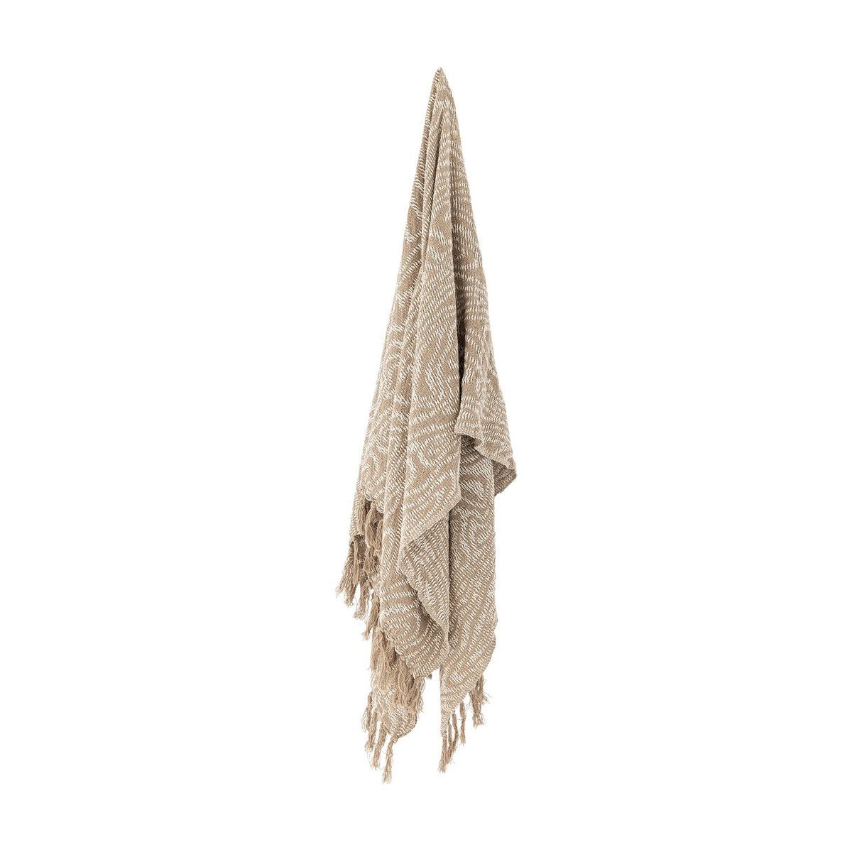 Okapi Cotton Throw in beige, hanging with a woven wavy-line pattern and fringed edges, against a plain white background.