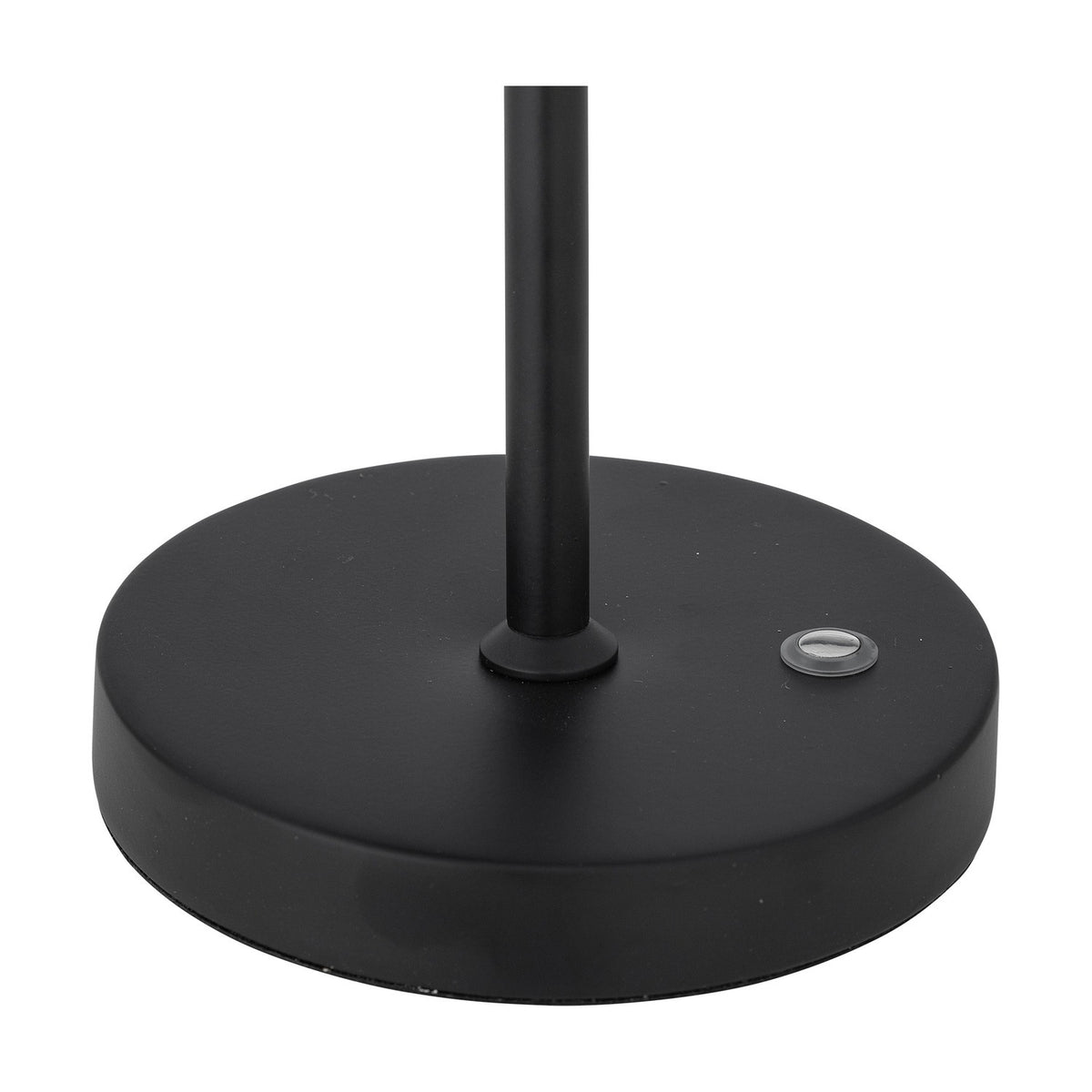 Close-up of the Lianna rechargeable table lamp's round black iron base with slender stem and visible charging port, set against a white background.
