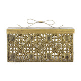 Gretl gold iron Christmas storage box with lift-off lid, openwork floral rosette and geometric pattern on sides, metal bow detail on top, plain white background.