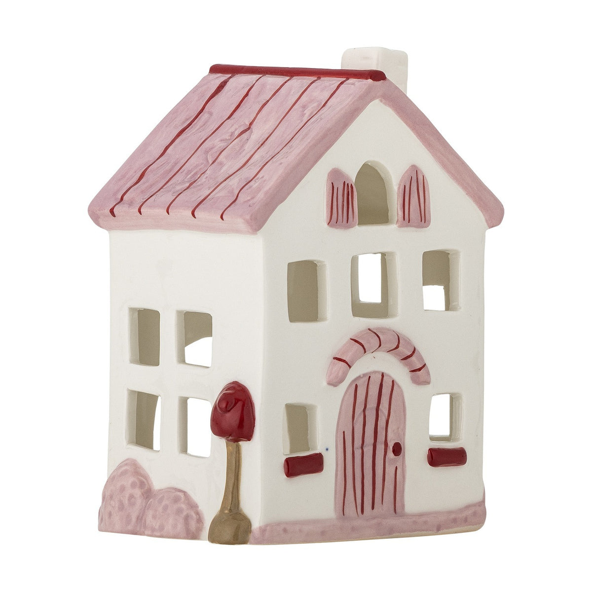 Shirly House stoneware tealight holder in white, shaped like a cottage with a pink pitched roof, chimney, cut-out windows and a hand-painted arched front door, on a plain white background.