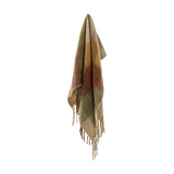 Hamisha Throw - Multi, a large woven check throw in olive, rust, and gold tones with chunky twisted fringe, draped on a hook against a plain white background.