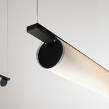 Ombra Fabric LED Pendant Light, close-up of the black top rail and circular end cap on a long off-white cylindrical fabric diffuser, suspended on thin wires against a plain light background.