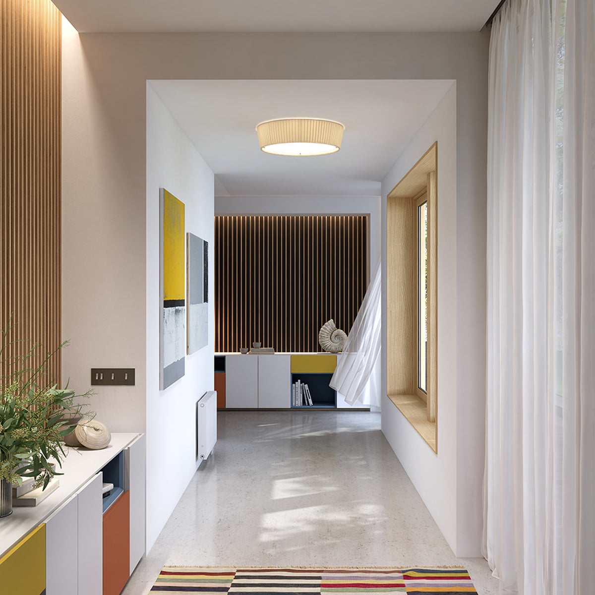 Plafonet 60 Ribbon LED ceiling light with pleated white drum shade, shown flush-mounted in a hallway with warm wood panelling and white decor.