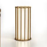 Roma Glass LED Table Lamp in Brushed Bronze, a tall cylindrical fixture with white glass panels framed by vertical bars and a scalloped star-shaped top, on a plain white background.
