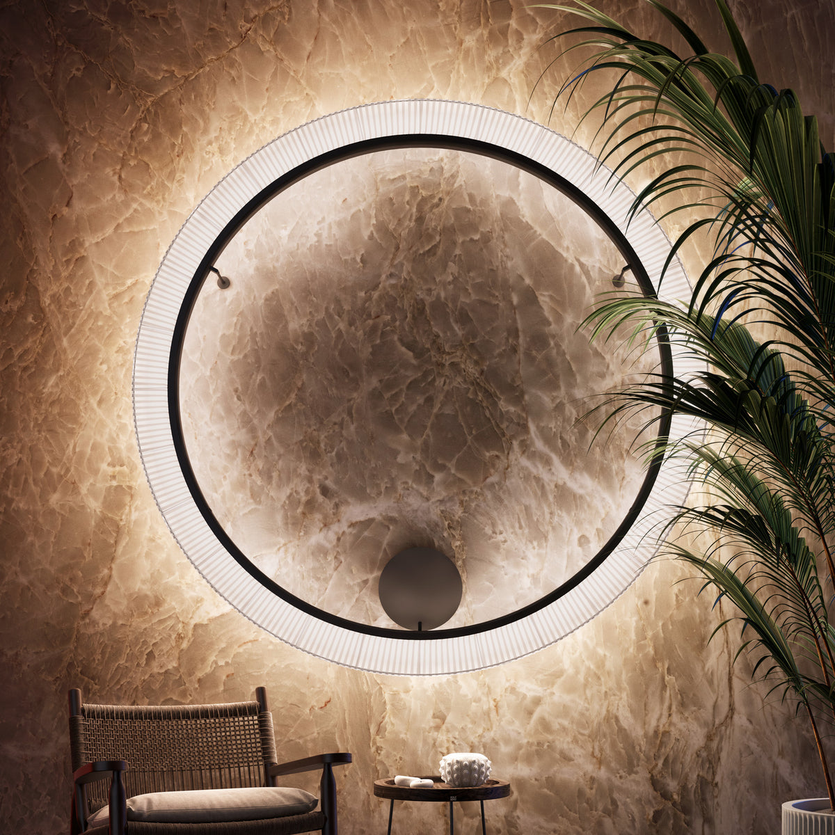 Roda PF/150 Ribbon LED wall light, a large circular fixture with pleated white translucent ribbon shade and slim black ring, glowing warm white on a stone wall beside a palm plant.