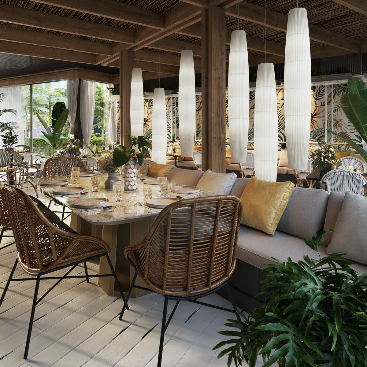 Maxi S/01 Ribbon LED pendant lights in white, tall tapered column shades with pleated banding, hung in multiples above a dining table in a tropical-themed restaurant setting.