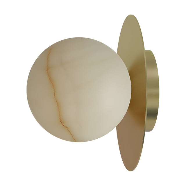 Royal alabaster globe wall light with a round matt polished brass disc backplate, creamy stone sphere with amber veining, shown on a plain white background.