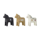 Set of three Siffer resin horse tealight holders in black, tan, and white, each hand-painted with festive Scandinavian folk-art motifs, on a plain white background.