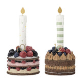 Set of 2 resin birthday cakes with berries, candles, and 10 and 12 toppers, gold flame accents, on a white background.
