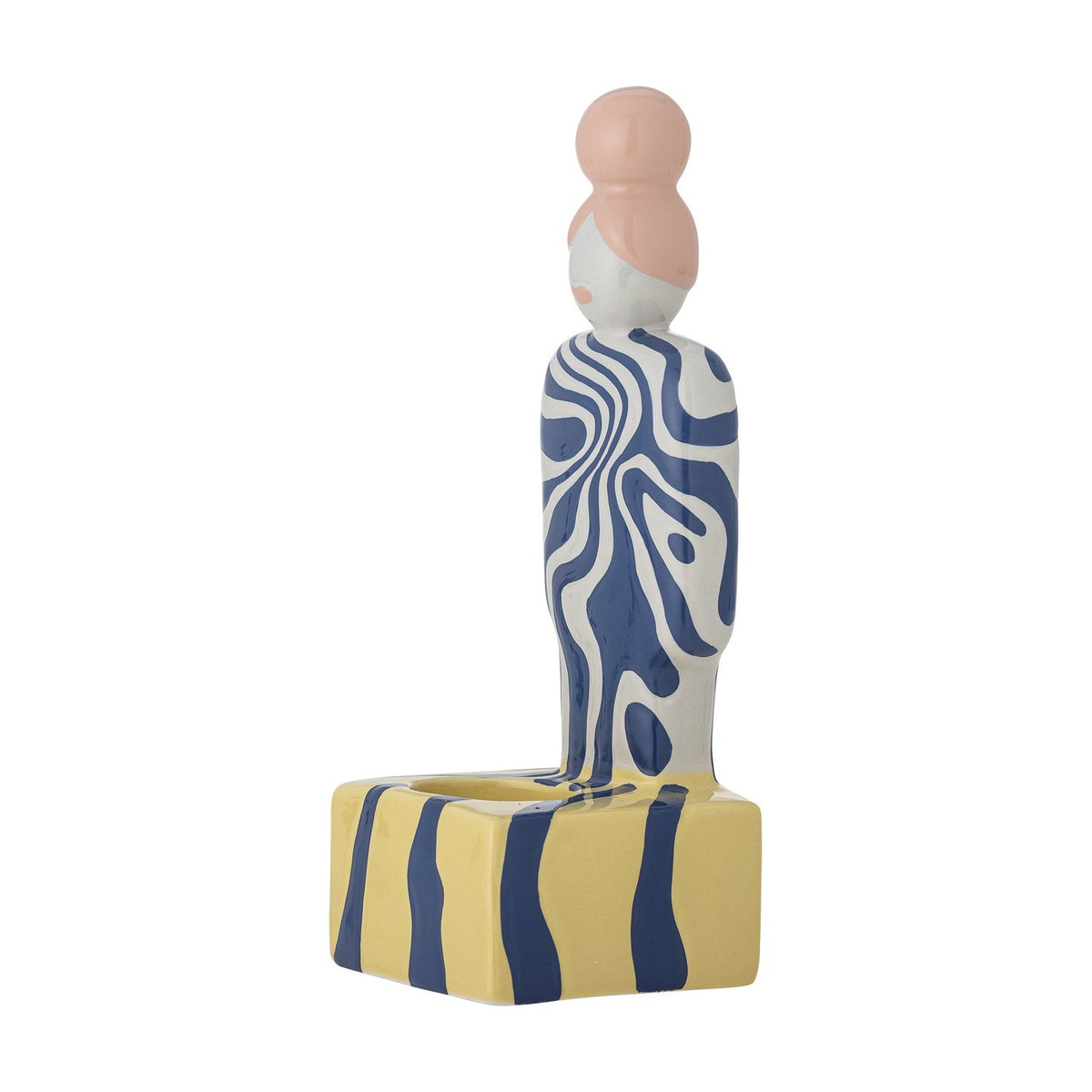 Priya Stoneware Tealight Holder in Multi: ceramic figure with pink bun and blue swirl-patterned body on a striped yellow and blue base, shown on white background.