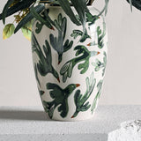 Birdliva Stoneware Vase 33cm in multi, rounded ceramic body with bird-in-flight pattern in green tones, holding foliage, set against a plain light background.