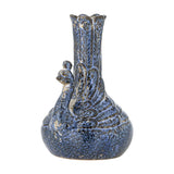 Kali Speckled Stoneware Vase 16cm in blue, shaped as a crested bird with a rounded base, carved feather details, and a tall neck opening into a scalloped rim, on a white background.