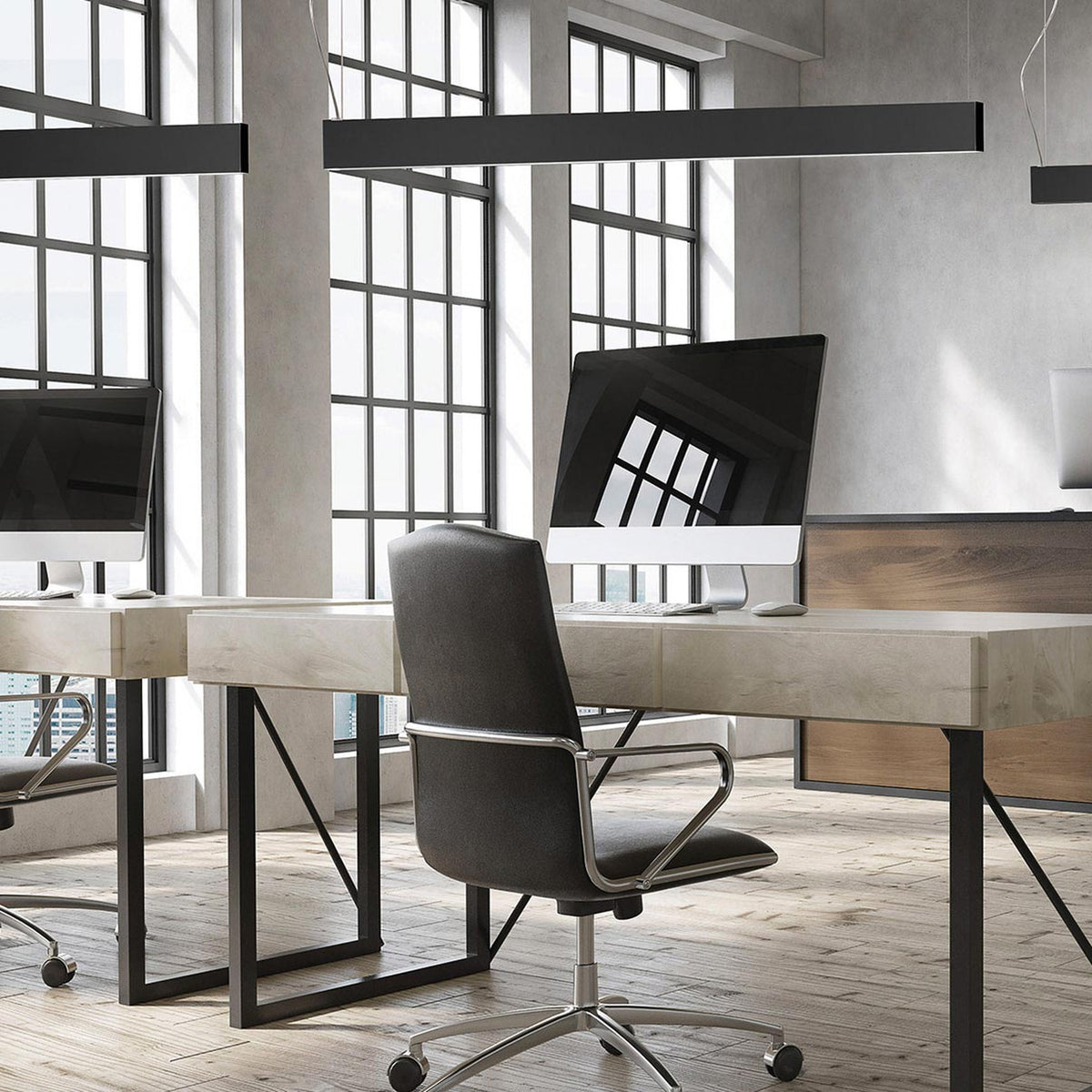 Giano Aluminium Linear LED Pendant Light 151.8cm in black, slim squared bar suspended above an office desk with computer monitors and a grey chair.