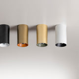 432 Ways Cylinder LED Ceiling Light, 10cm, shown in black, brass, gold, and white finishes with contrasting inner rims, mounted in a row on a plain wall.