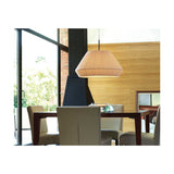 Mei 60 Ribbon Cone Pendant Light with a wide, pleated cream translucent shade, shown suspended above a dining table in a wood-panelled room.