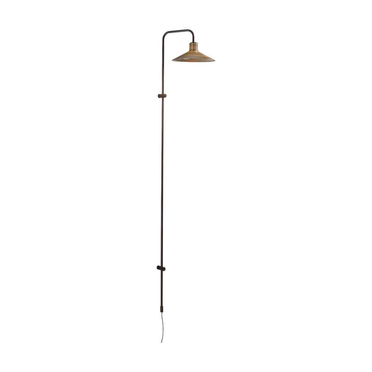 Platet A/05 wall light with a tall slim rod extending from floor level, curving at the top to hold a single shallow cone shade in antique brass, aluminium finish, on a plain white background.