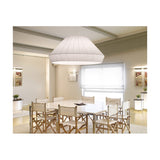 Mei 150 Ribbon Pendant Light with a large tapered white pleated shade hanging above a dining table in a neutral, modern dining room.