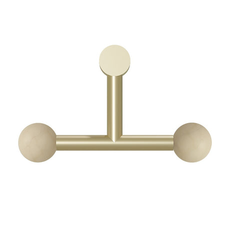 Rigoberta Trio wall light in gold-finished iron with a T-shaped design, round wall plate, and two alabaster globe shades on a horizontal bar, shown on a plain white background.