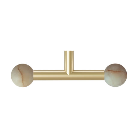 Rigoberta Trio Alabaster Globe Pendant Light in gold, featuring a horizontal gold bar with two cream alabaster globes and a central drop stem, shown on a white background.