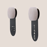 Two Rock wall lights with alabaster round heads and matt black iron signage tags cut with room numbers 373 and 126, shown on a plain light background.