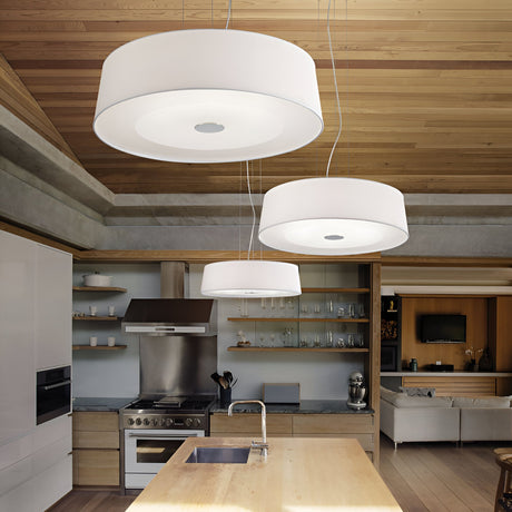 A modern kitchen with three Satin 4 Suspension Lights in white hanging from a wooden ceiling showcases sleek design. The space features a central island with a sink, stainless steel appliances, open shelving, and a chrome frame accent for added elegance, all opening into a stylish living area.