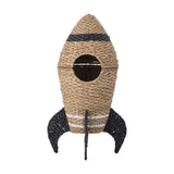 Cosmina Rocket Seagrass Basket with Lid in natural woven seagrass and rattan, featuring a dark window, black fins, and a lift-off nose cone lid, shown on a plain white background.