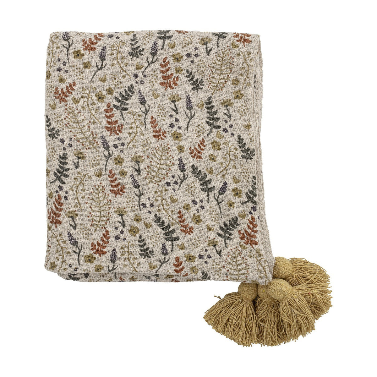 Filipa Floral Cotton Throw in multicoloured botanical print, folded with chunky mustard tassels at the corner, shown on a plain white background.