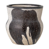 Nala Terracotta Plant Pot in black, a rounded vessel with pinched neck and flared rim, speckled sandy clay with hand-painted black leaf-like strokes, shown on a plain white background.