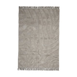 Elaine Wavy Cotton Rug in natural, 210x150cm, with raised wavy woven texture and fringed edges, shown flat on a plain white background.