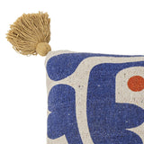 Eviaya Cotton Cushion corner detail in Multi, showing a mustard tassel and bold abstract blue and orange print on cotton fabric against a white background.