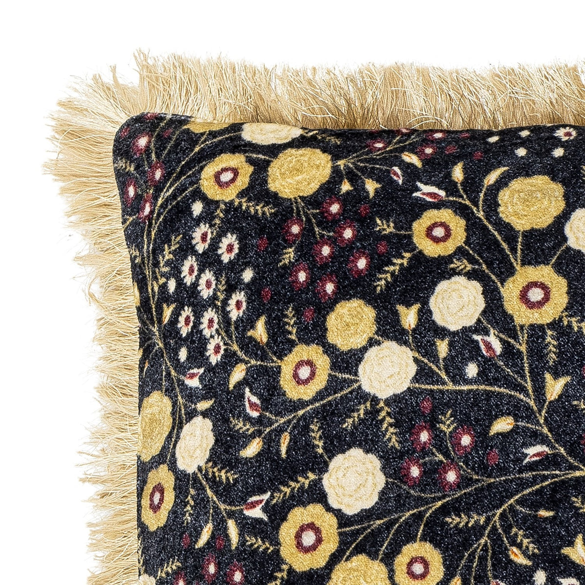 Eydis Floral Cushion in Multi, square fabric cushion with dense floral print in gold, white and burgundy on black, edged with tonal fringe, shown on a white background.