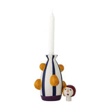 Conneli Ceramic Candle Holder in multicoloured striped dolomite with raised bumps and a detachable painted face head, shown with a white taper candle on a plain background.