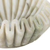Close-up of the Harmonia Fluted Marble Bowl in white, showing deep pleated flutes and a wavy scalloped rim in polished marble with subtle grey-green veining.