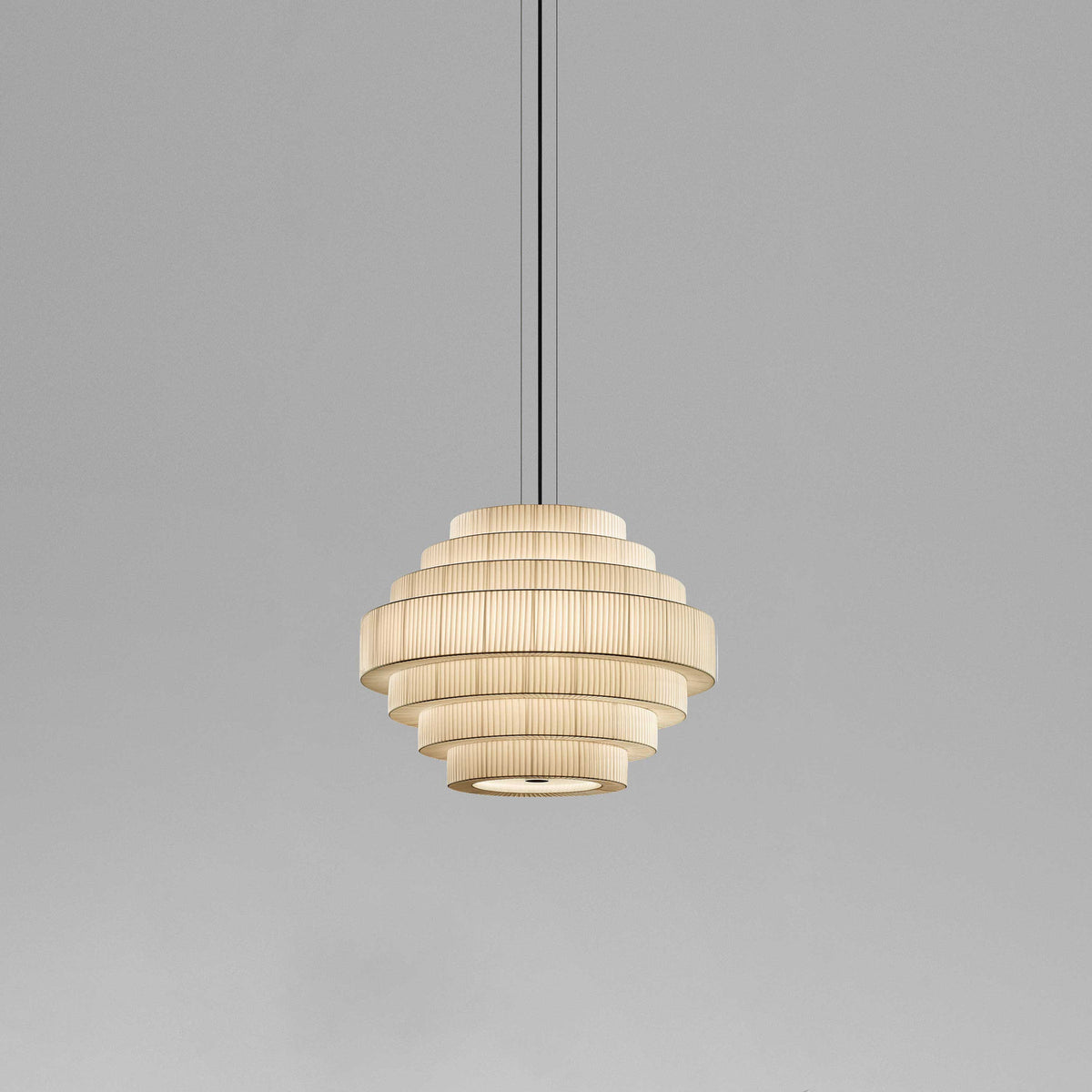 Mos 02 Ribbon Tiered Pendant Light with seven pleated beige translucent ribbon tiers in a stacked beehive shape, iron structure, shown against a plain grey background.