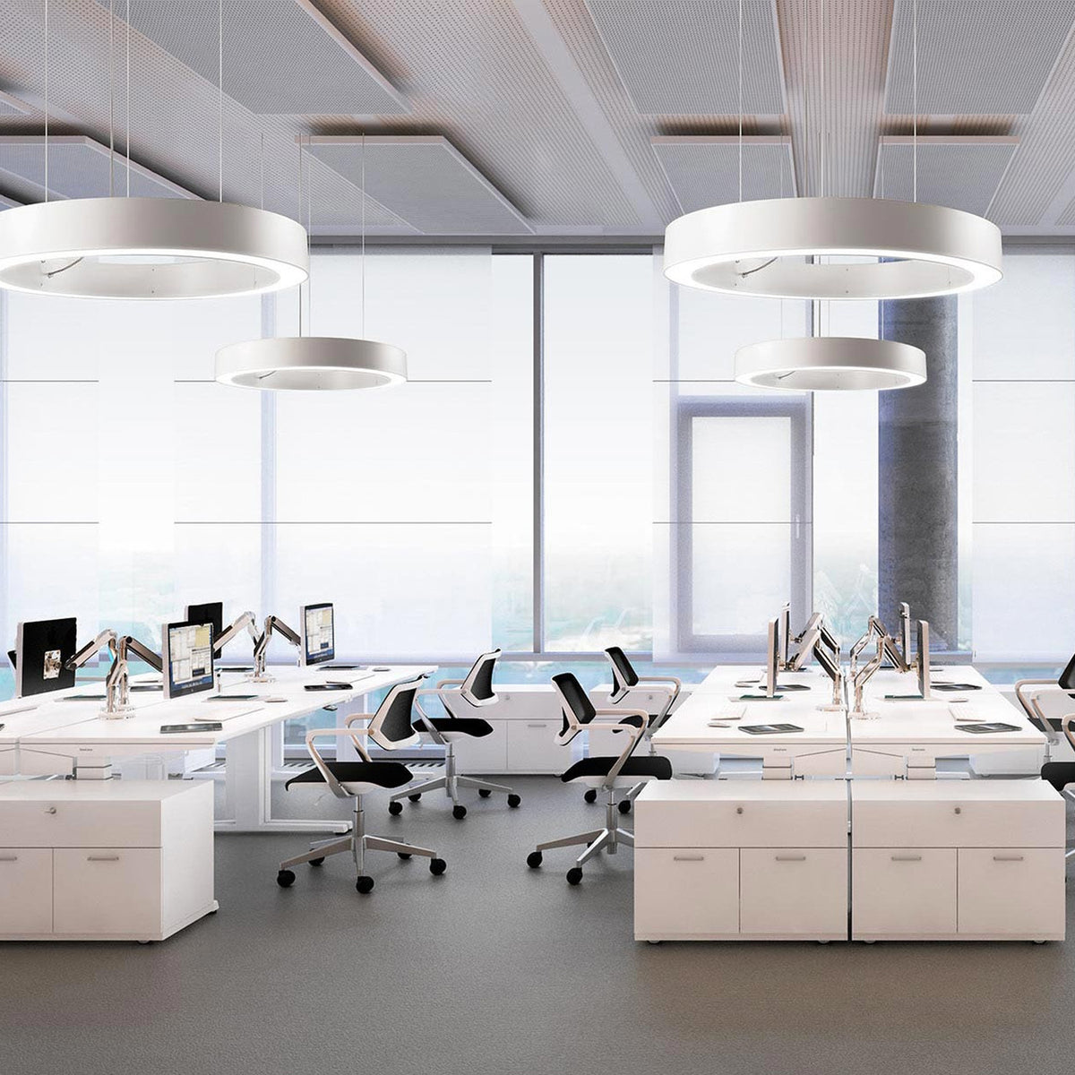 Golden Ring Aluminium LED Pendant Light 123cm shown in pairs of large circular white pendants above an open-plan office with white desks and black chairs.
