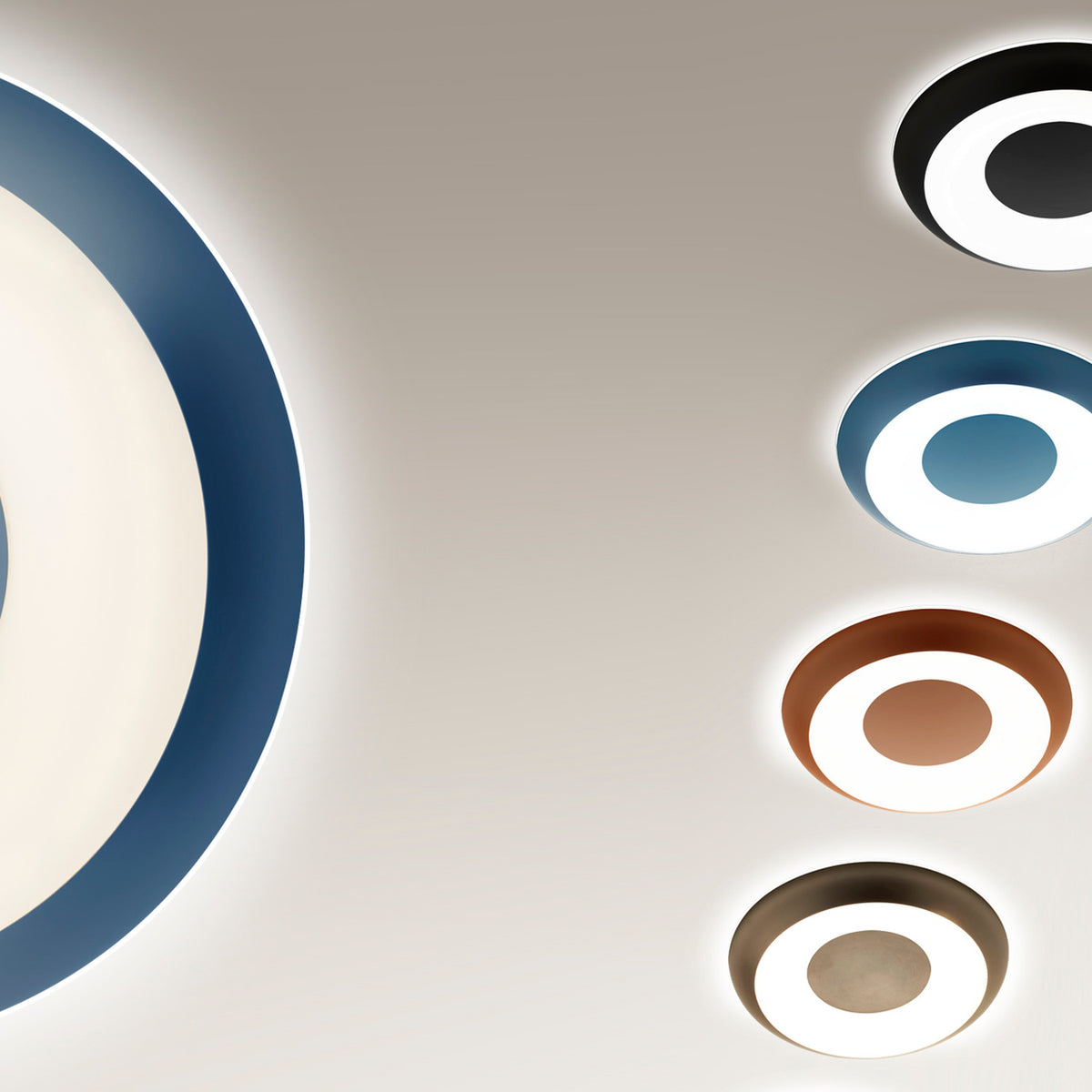 Superbold LED Wall & Ceiling Light 44.3cm shown as round flush fixtures in black, blue, bronze and brown finishes, each with a glowing white ring and solid centre disc.