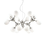 The Emblaze 15 Light Suspension - White, a stunning example of contemporary lighting, showcases an array of spherical white lights with frosted glass shades linked by sleek metallic branches. Its avant-garde design, suspended from a single wire, artistically mimics a molecular structure.