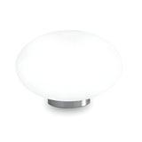 The Look Table Lamp - White is a contemporary round table lamp featuring a sleek metal base and a smooth, opaque glass shade. Its white finish enhances its modern design, providing soft, diffused light perfect for ambient lighting in modern spaces.