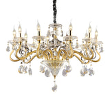 Introducing the Prismara Crystal 10 Light Chandelier - Gold, a luxurious lighting masterpiece featuring exquisite gold detailing and sparkling crystal pendants. This chandelier boasts ten candle-shaped lights arranged in two elegant tiers, suspended by a decorative black chain for an added touch of sophistication.
