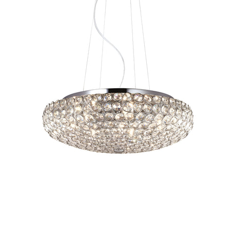 Introducing the Queen 7 Light Crystal Suspension in Chrome, a modern circular chandelier featuring a polished chrome finish and adorned with numerous sparkling crystal accents. This stunning light fixture hangs from thin wires, emitting a bright and elegant glow, making it perfect for contemporary homes.