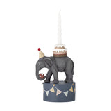 Multicoloured 18cm resin candle holder shaped as a party elephant carrying a two-tier cake and ball on a bunting-decorated base, with a white spiral candle.