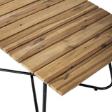 Close-up of the Hampton Wooden Garden Table in brown, showing slatted acacia wood top with visible grain detail on a black powder-coated hairpin iron frame.