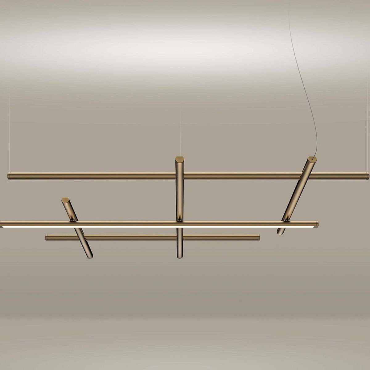 Hilow LED pendant light in brushed brass, three long bars crossed by three shorter bars forming an open grid, suspended by thin cables against a neutral background.