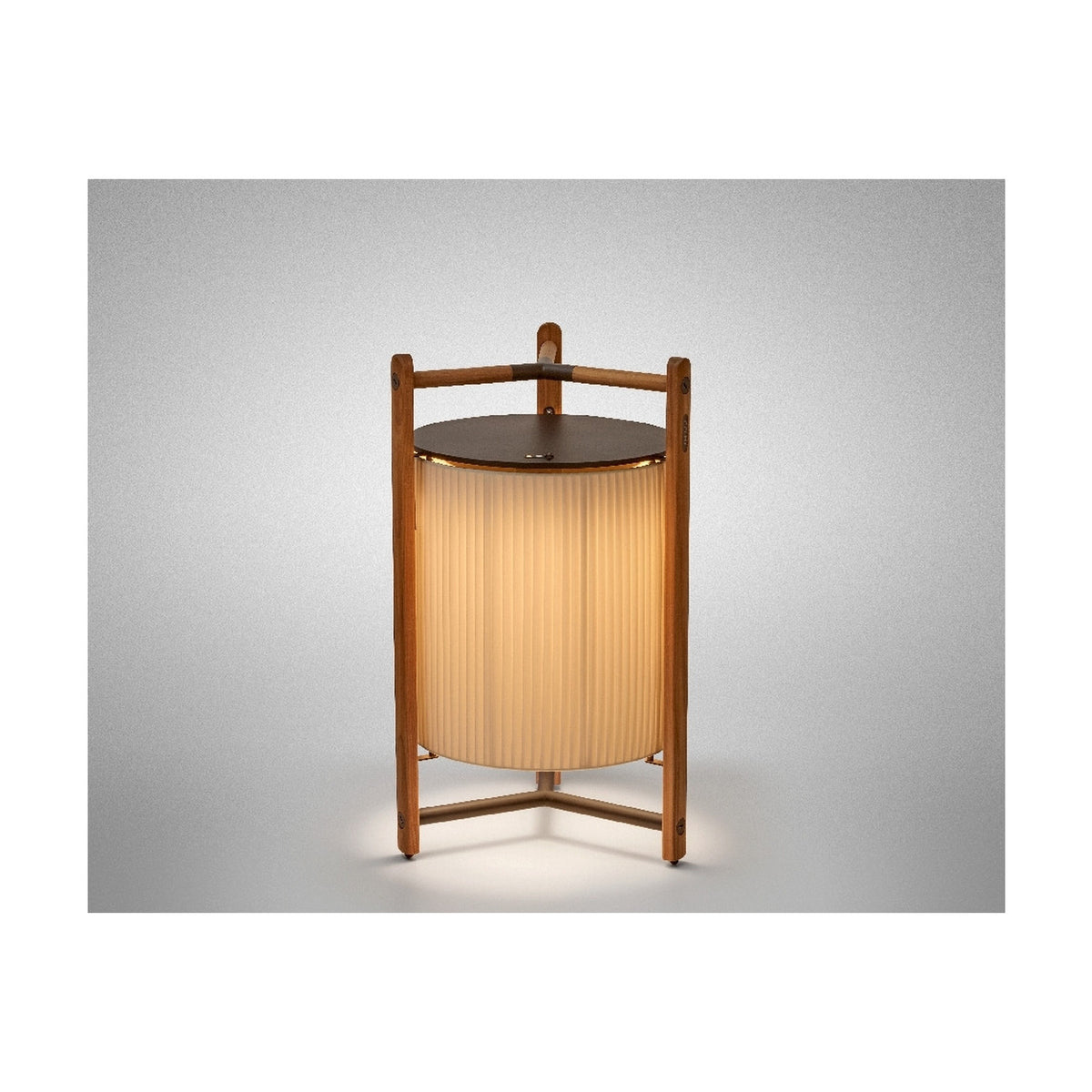 Kando P/76/R rechargeable LED floor lamp with pleated white ribbon shade in an open wooden tripod frame, lit against a plain grey background.