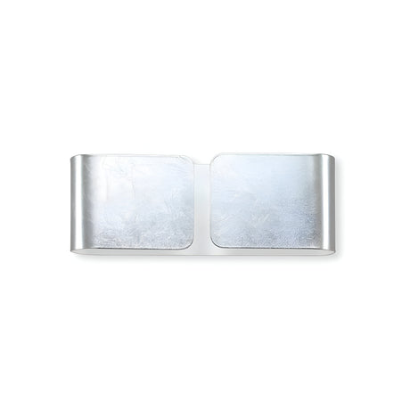 The Halox 2 Light Mini Wall Light - Silver exemplifies modern lighting design with its sleek silver finish and two flat, rectangular panels with subtly curved edges. Arranged side by side against a white background, this minimalist piece radiates contemporary elegance.
