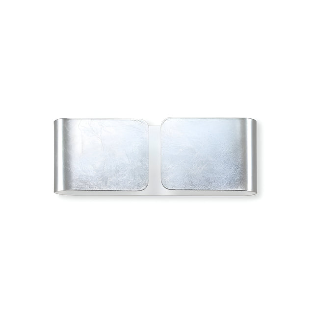 The Halox 2 Light Mini Wall Light - Silver exemplifies modern lighting design with its sleek silver finish and two flat, rectangular panels with subtly curved edges. Arranged side by side against a white background, this minimalist piece radiates contemporary elegance.