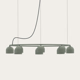 Rio 9 Circular Dome Ring Chandelier in green, a slim iron ring fitted with small downward-facing dome shades, suspended on cables against a plain light background.