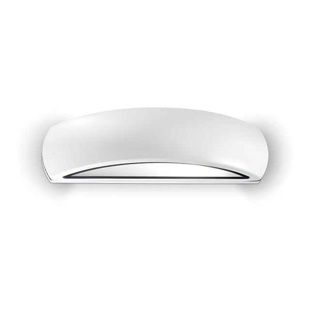 The Solara Outdoor Wall Light, featuring a sleek and modern design in silver metallic powder-coated aluminum with a curved shape, elegantly stands out against a plain white background. This fixture emits a soft, diffused light and boasts an IP54 rating, making it perfect for outdoor use as it creates an inviting gentle glow.